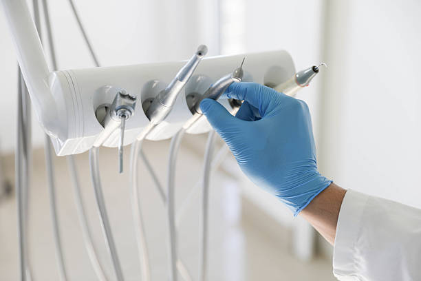 Professional Tooth Extraction technician working in Fruitport, MI